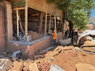 Strategic Home Division: Installing a Fresh Brick Wall for Enhanced Privacy and Distinctive Separation